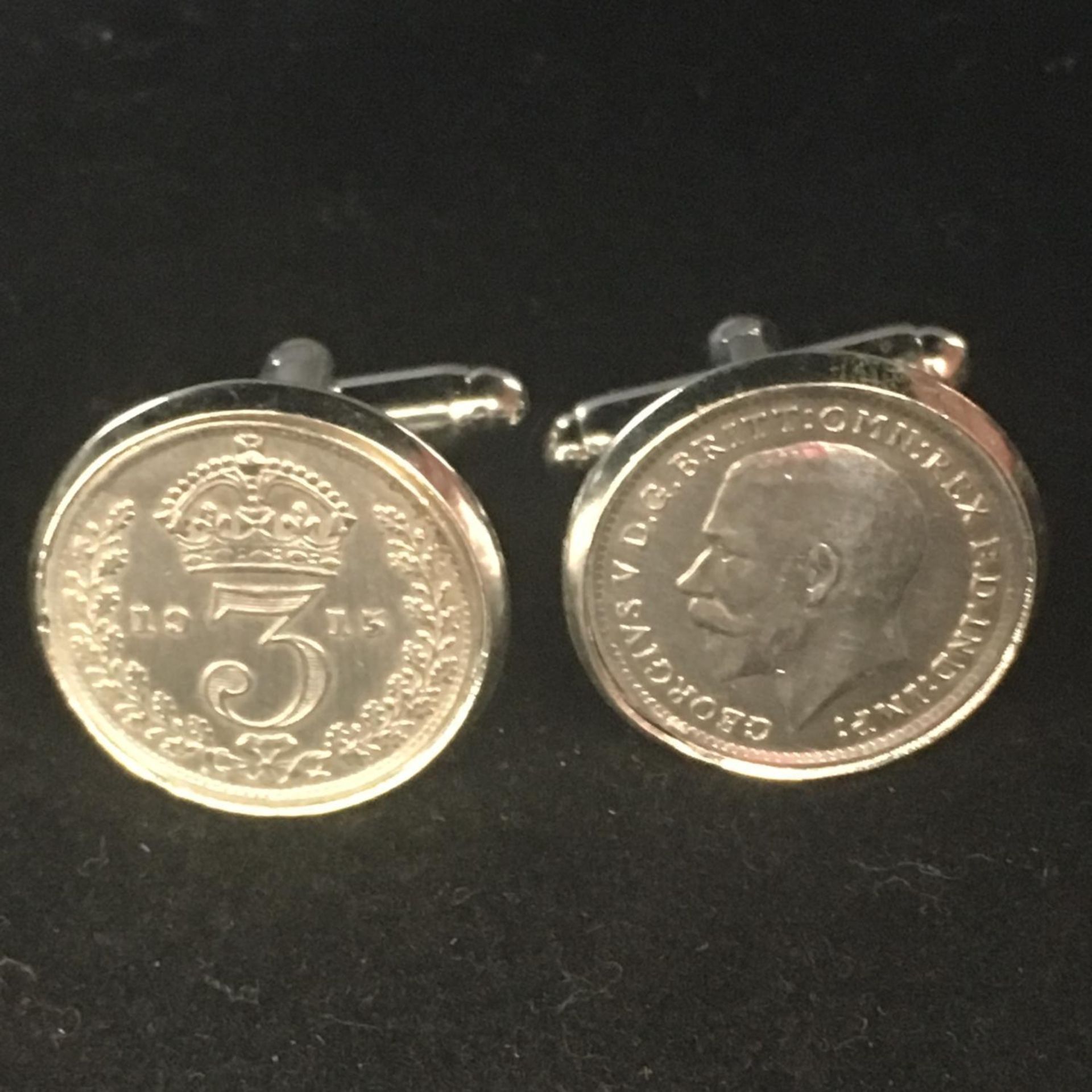 ANTIQUE PAIR OF STERLING SILVER THREEPENCES CUFFLINKS. Dated 1915 and set in silver plated