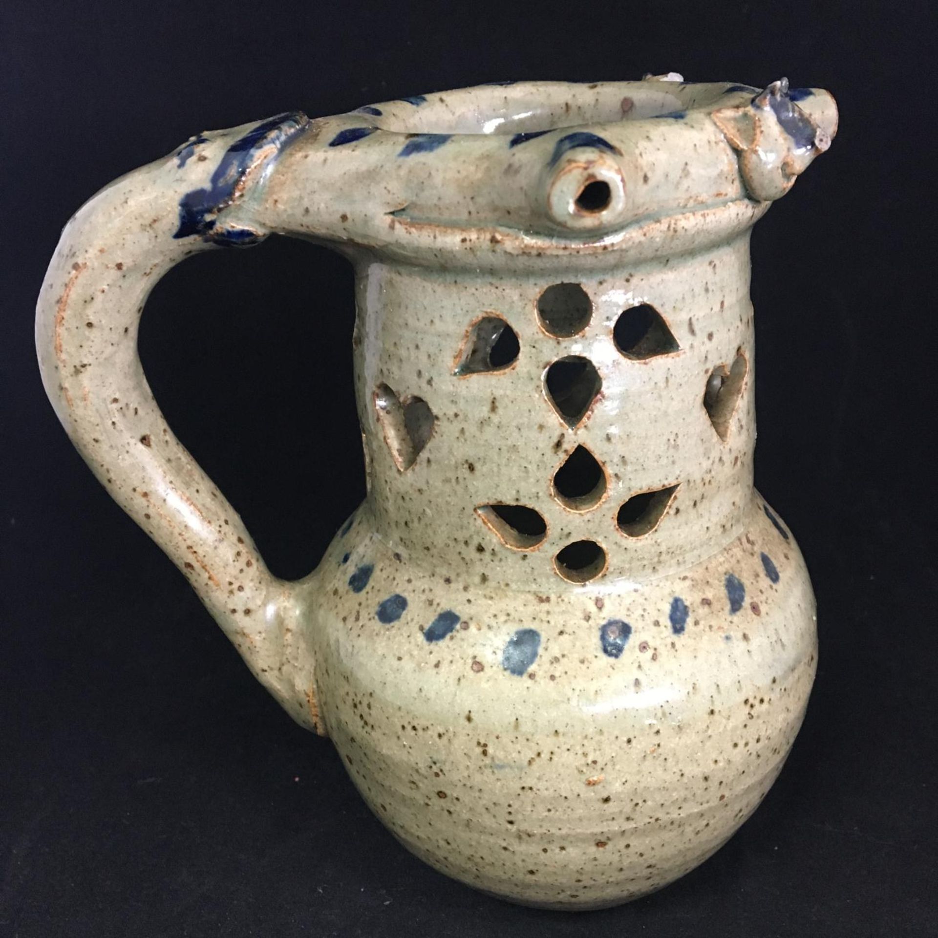 Vintage studio pottery puzzle jug with unidentified studio potter's stamp to underside. Having snake