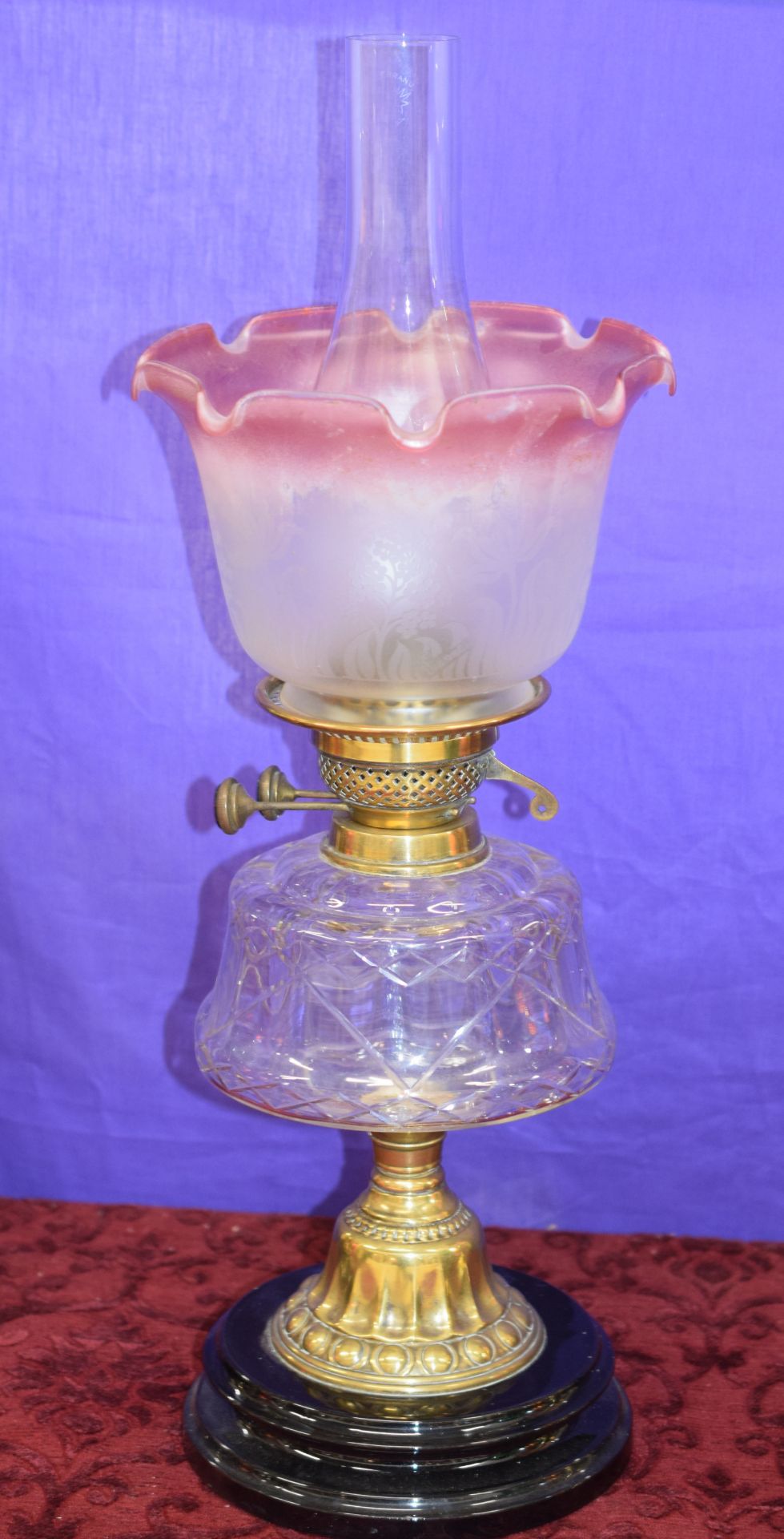 Victorian Oil Lamp With Plain Glass Reservoir And Cranberry Frilled Globe
