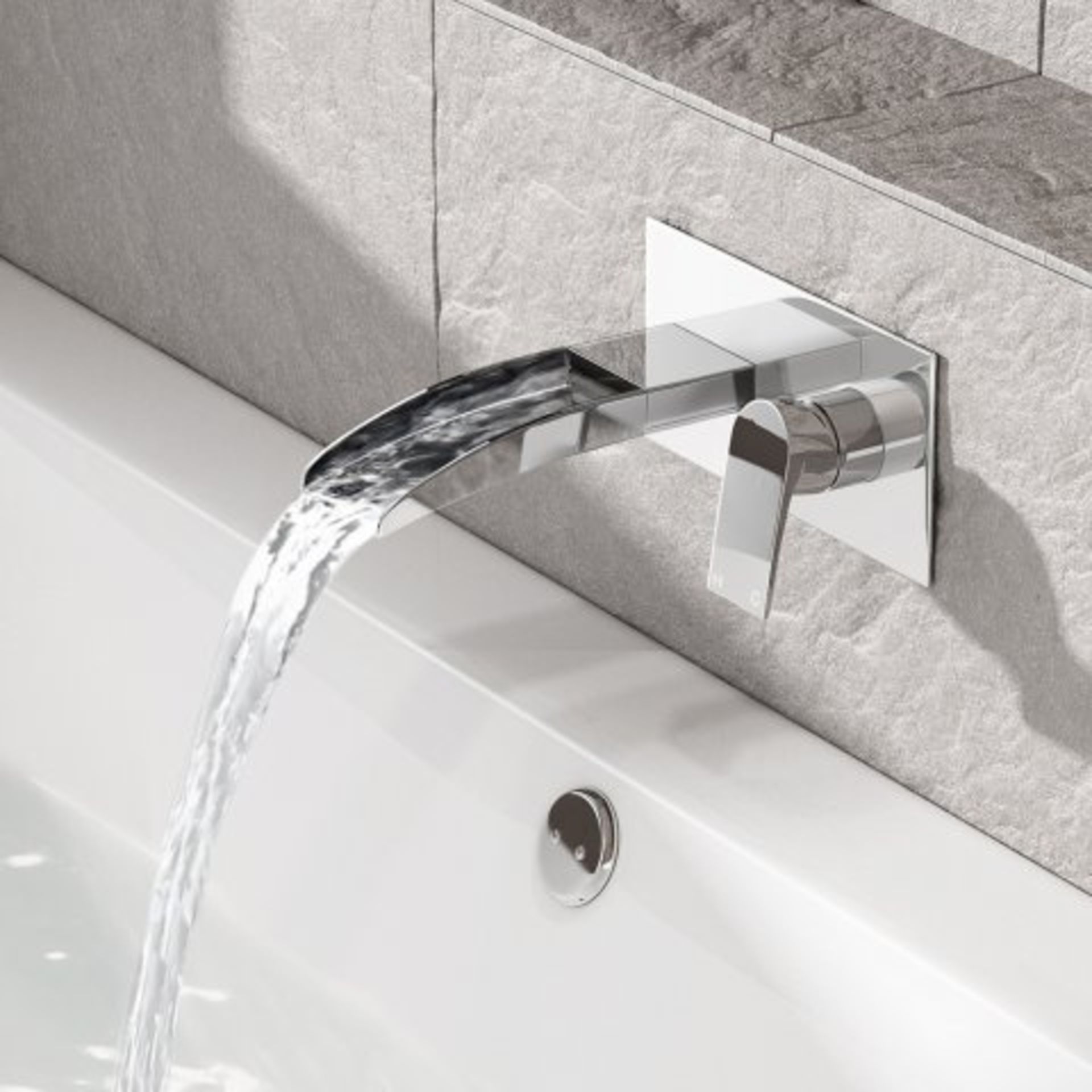 (H39) Avis II Wall Mounted Waterfall Bath Mixer Tap This wall mounted basin taps adds a touch of