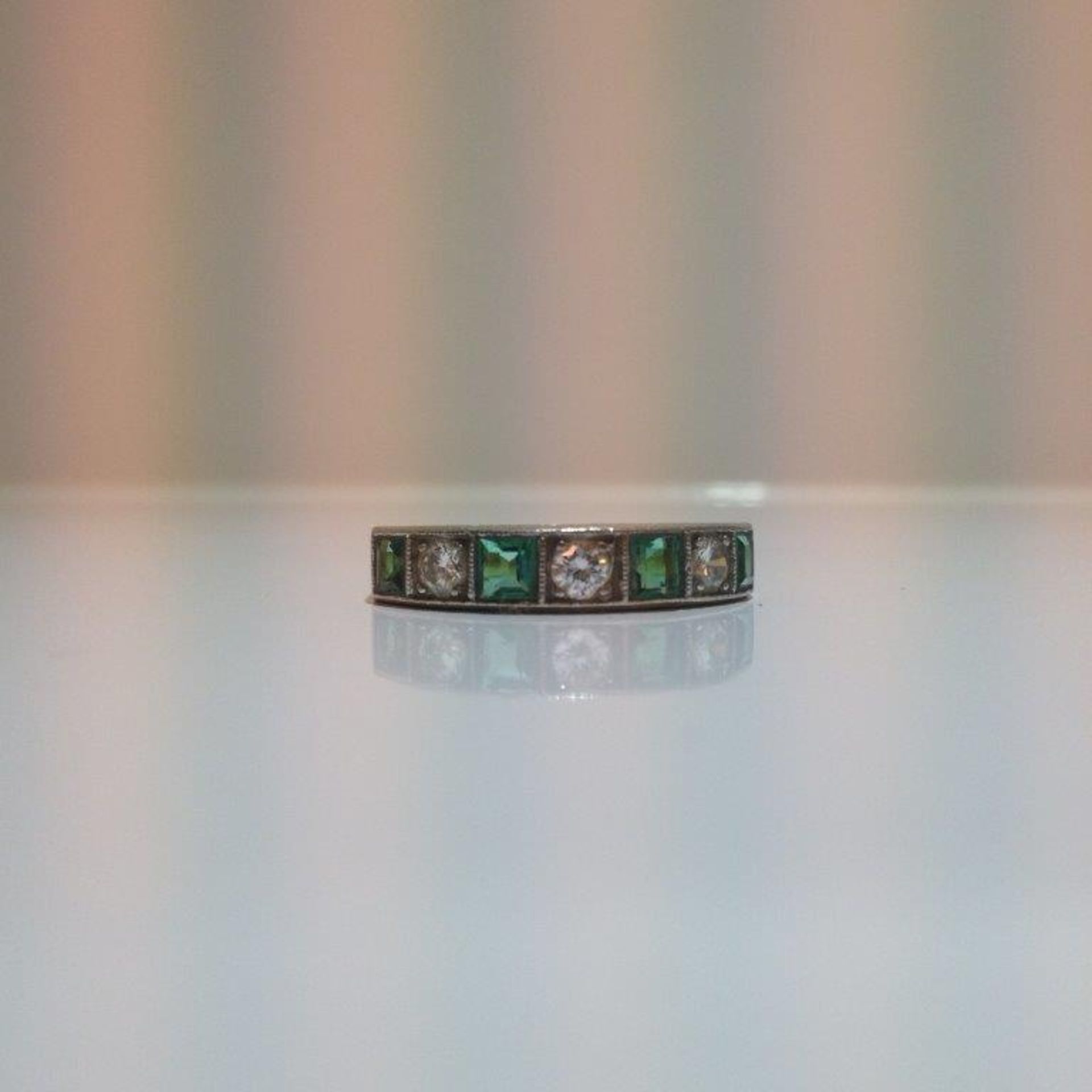 Pre owned 18ct yellow gold Diamond and Emerald 7 stone Eternity Ring - Image 2 of 4
