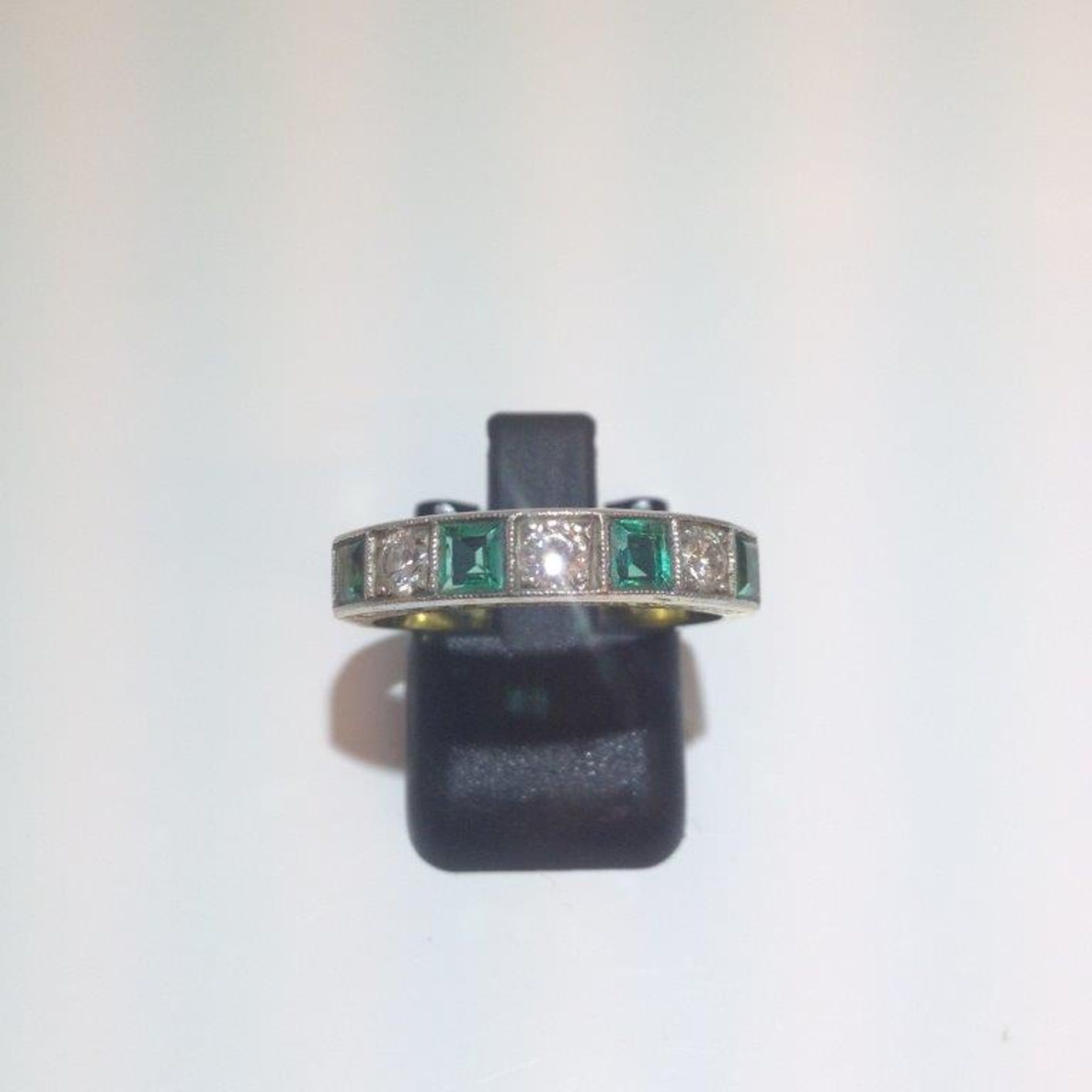 Pre owned 18ct yellow gold Diamond and Emerald 7 stone Eternity Ring