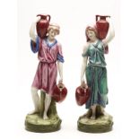 PAIR ANTIQUE ROYAL DUX PAINTED WATER CARRIER FIGURES c.1900