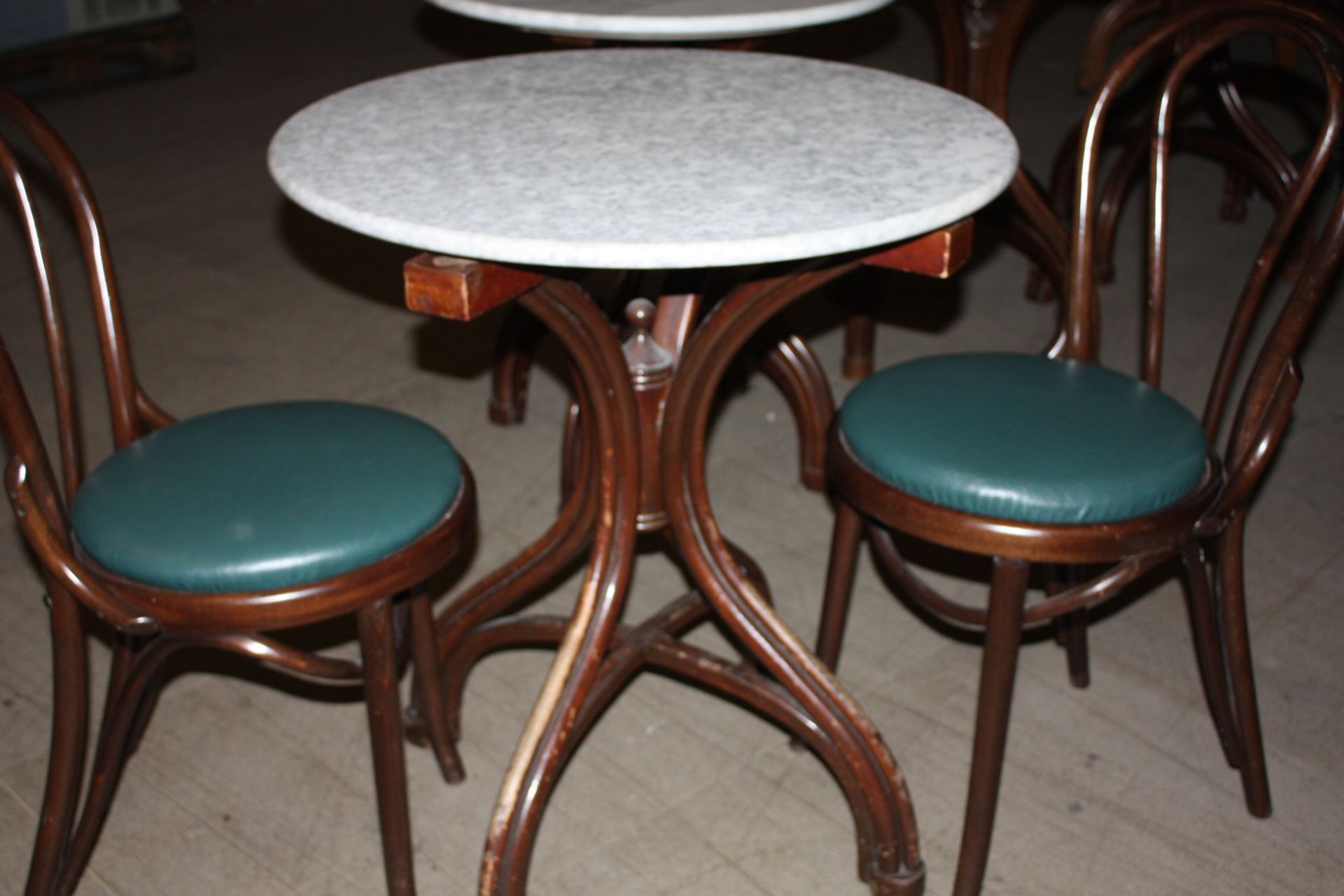 2 x Solid Marble Top Tables 700mm Diameter and 4 x bentwood chairs with green leather upholstery