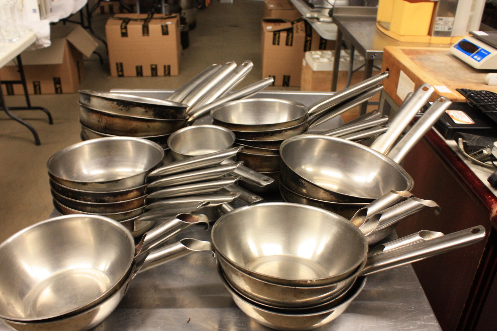 Approx' 27 stainless steel frying / sauce pans.