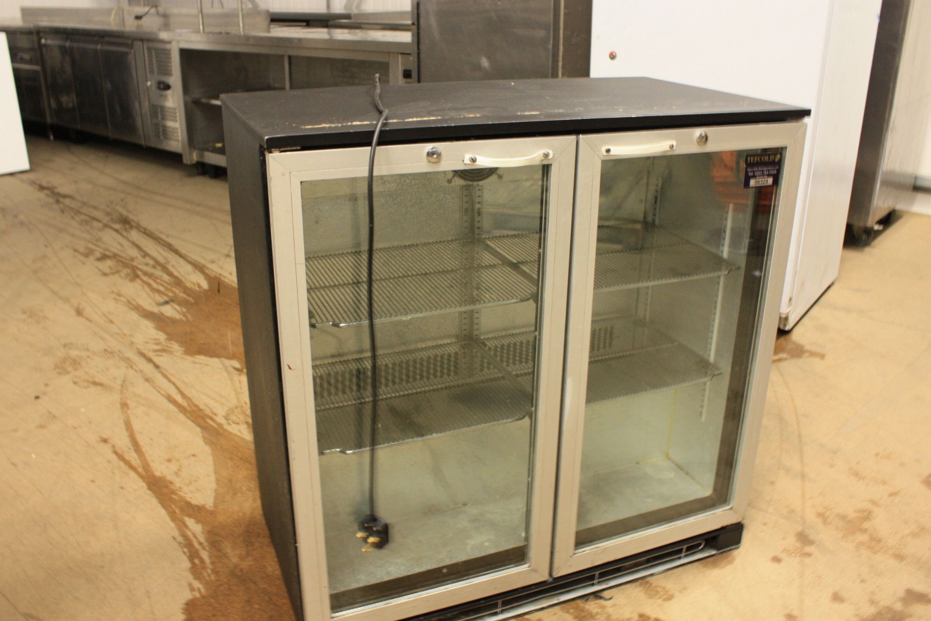 Tefcold double door bottle fridge. Size: 900mm wide x 500mm deep x 900mm high.