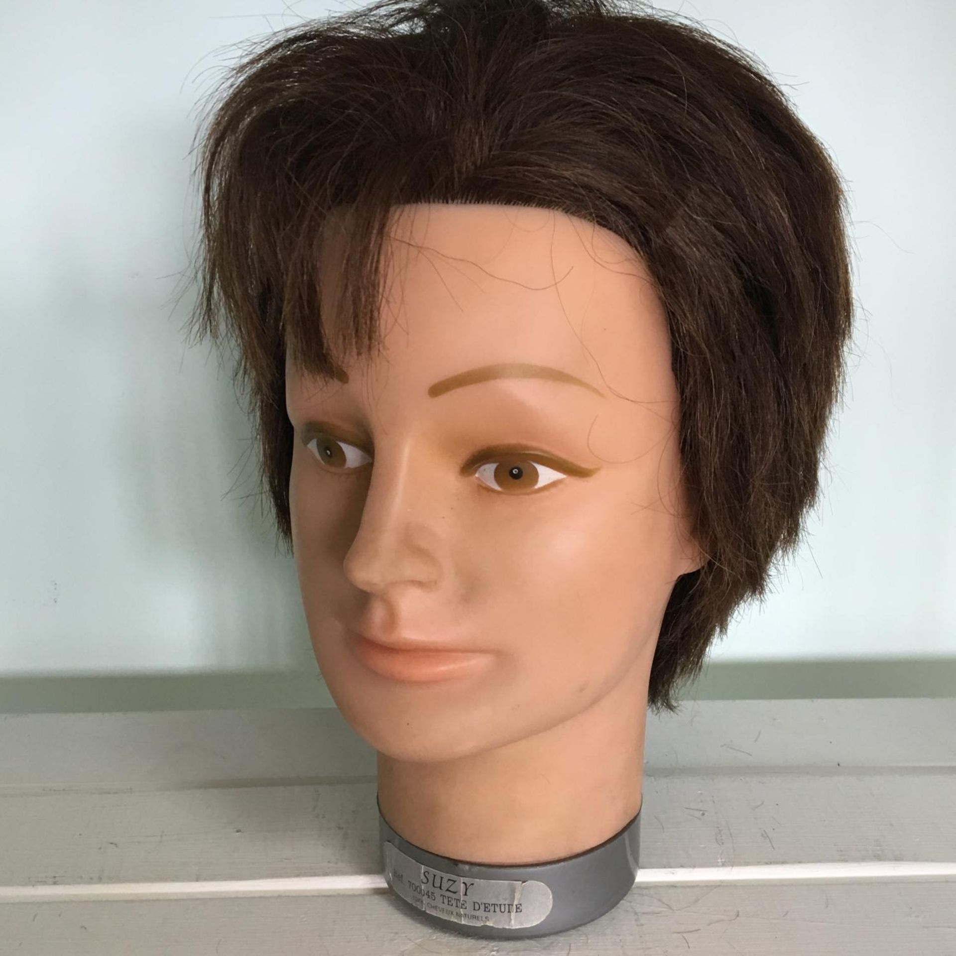 Vintage display model head with real hair. Includes free UK delivery.
