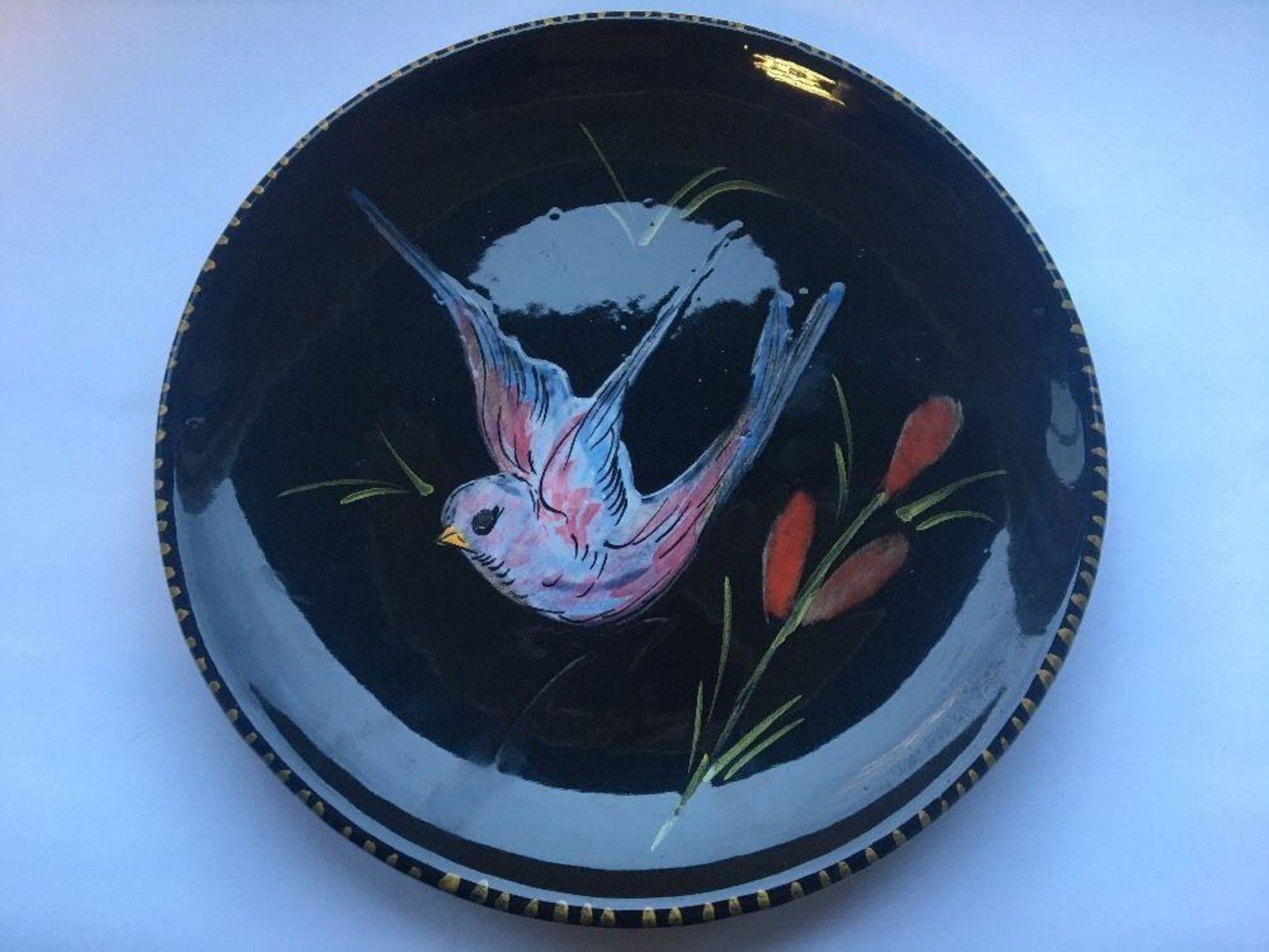 Signed studio art pottery handpainted bird black plate unknown indistinct maker. Measures 18cm - Image 2 of 4