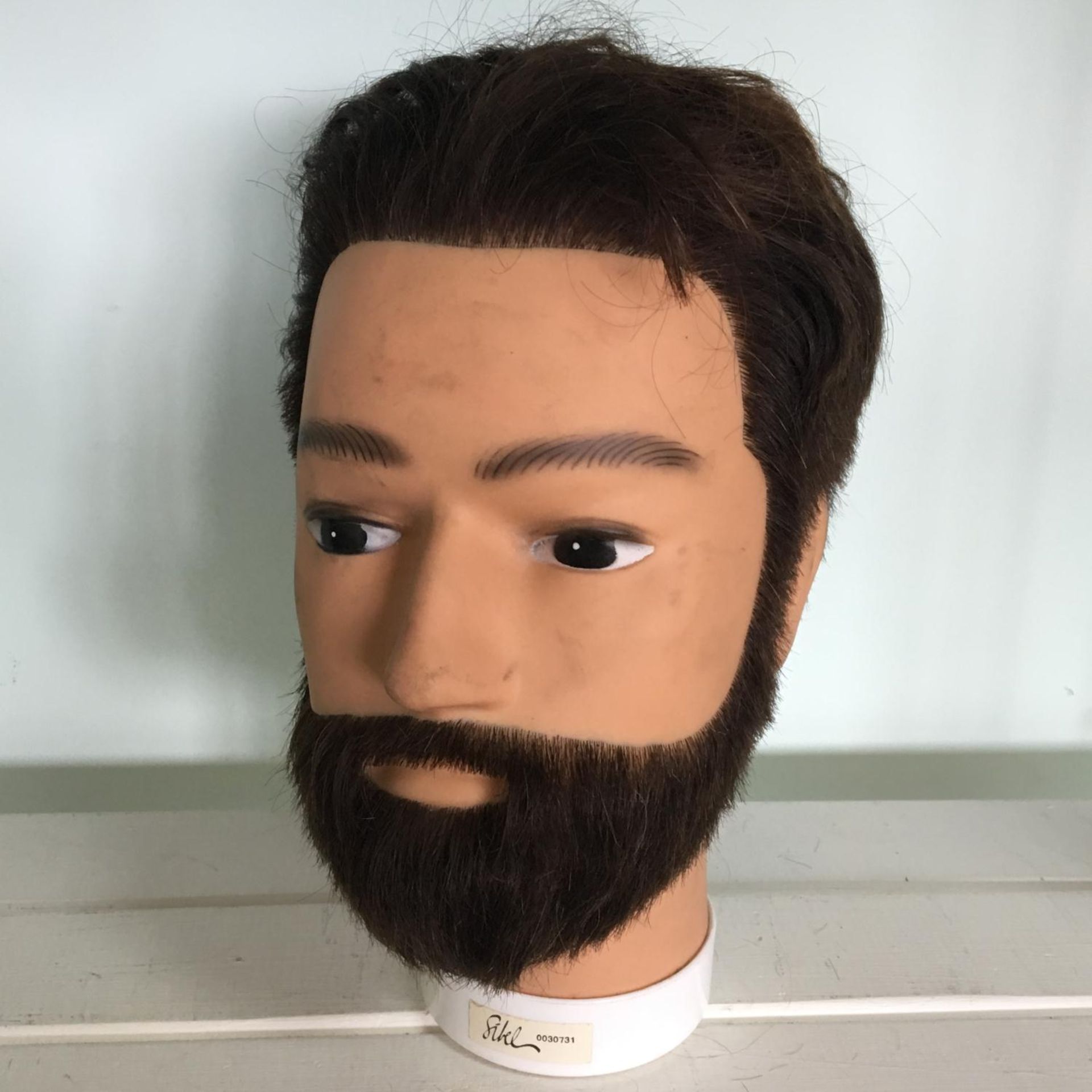 Vintage display model head with real hair. Includes free UK delivery.