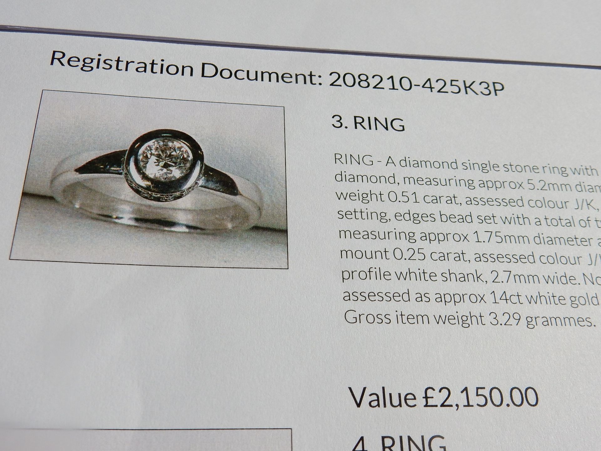 A 14 carat white gold single stone ring with diamonds set mount sides. - Bild 4 aus 4
