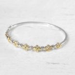 Unbranded, 18k White Gold Fancy Yellow Diamond Floral Bangle