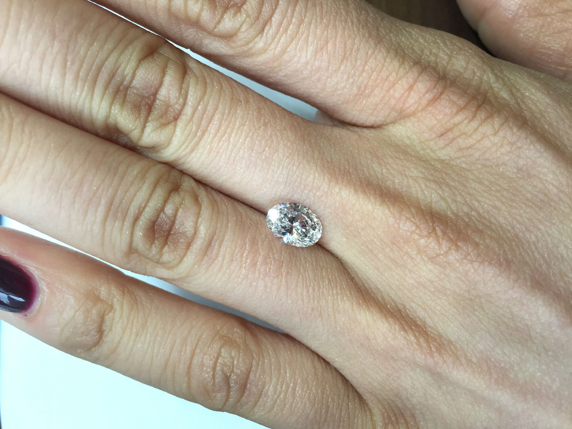 1.08ct oval cut diamond. E colour, VVS2 clarity. No certificate. Valued at £11310For more - Image 4 of 4