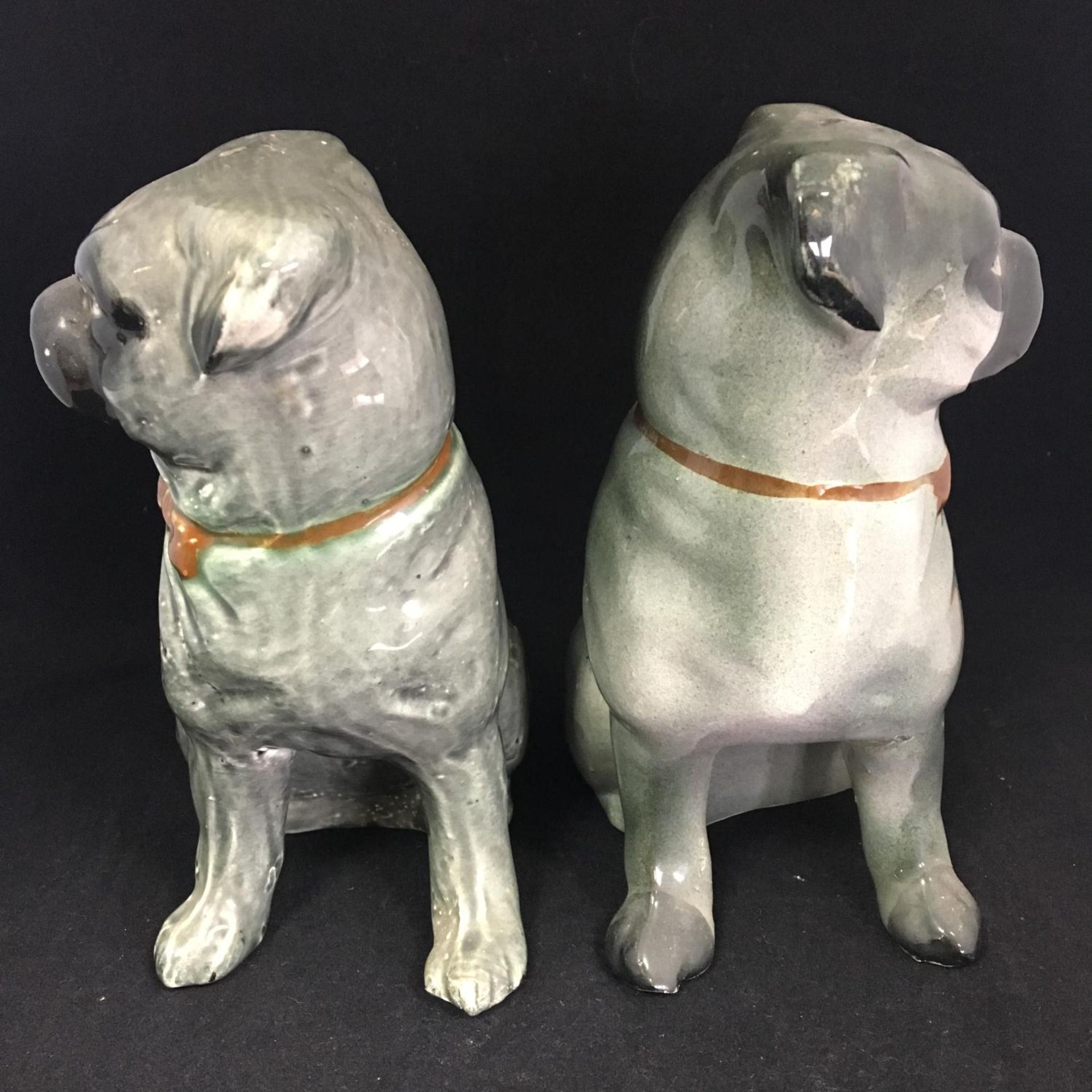 Antique Victorian era ceramic seated pugs. Matched (not an exact pair). Standing around 20cm high. - Image 2 of 6