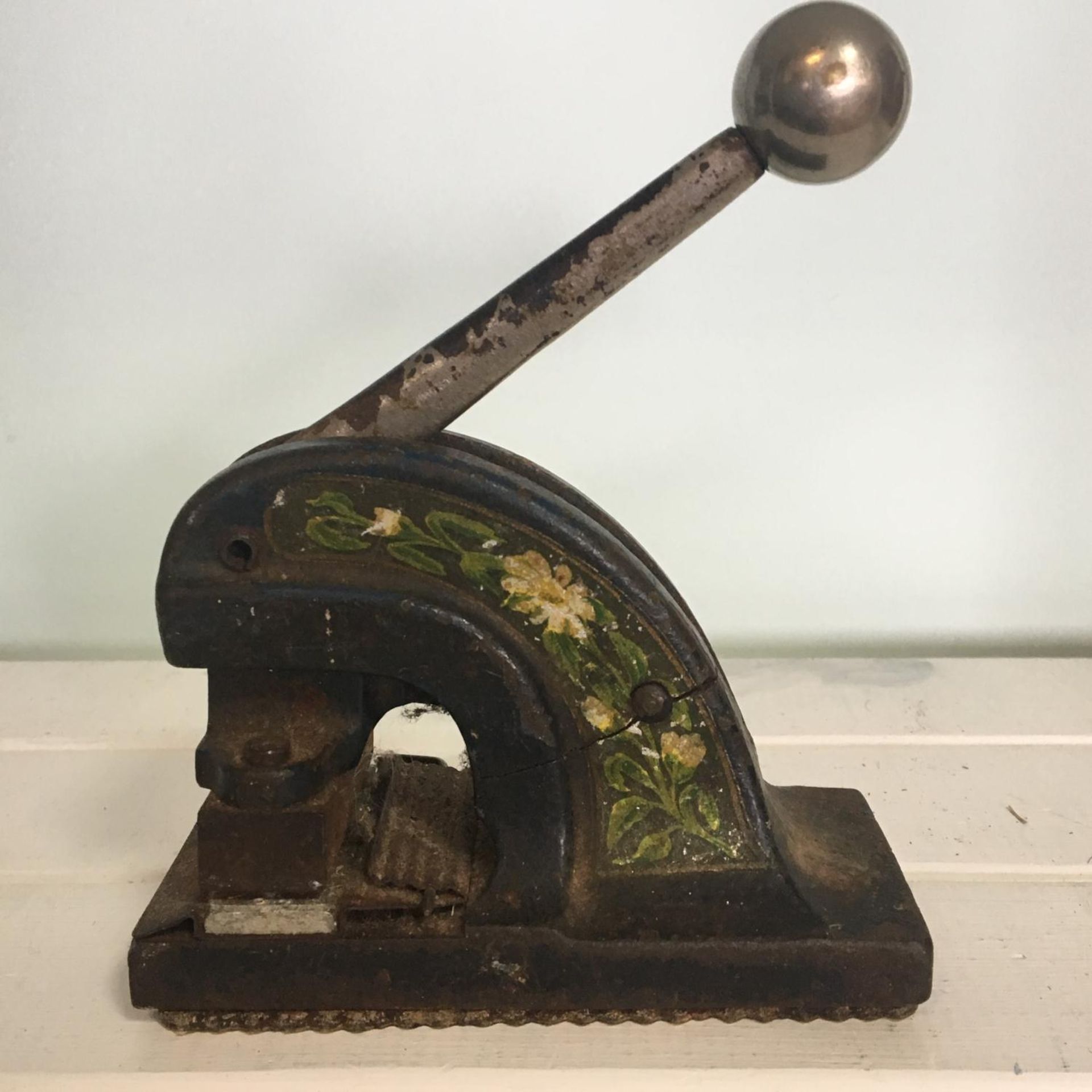 Victorian cast iron letter press with painted foliate detailing. Has crack as shown. Includes free