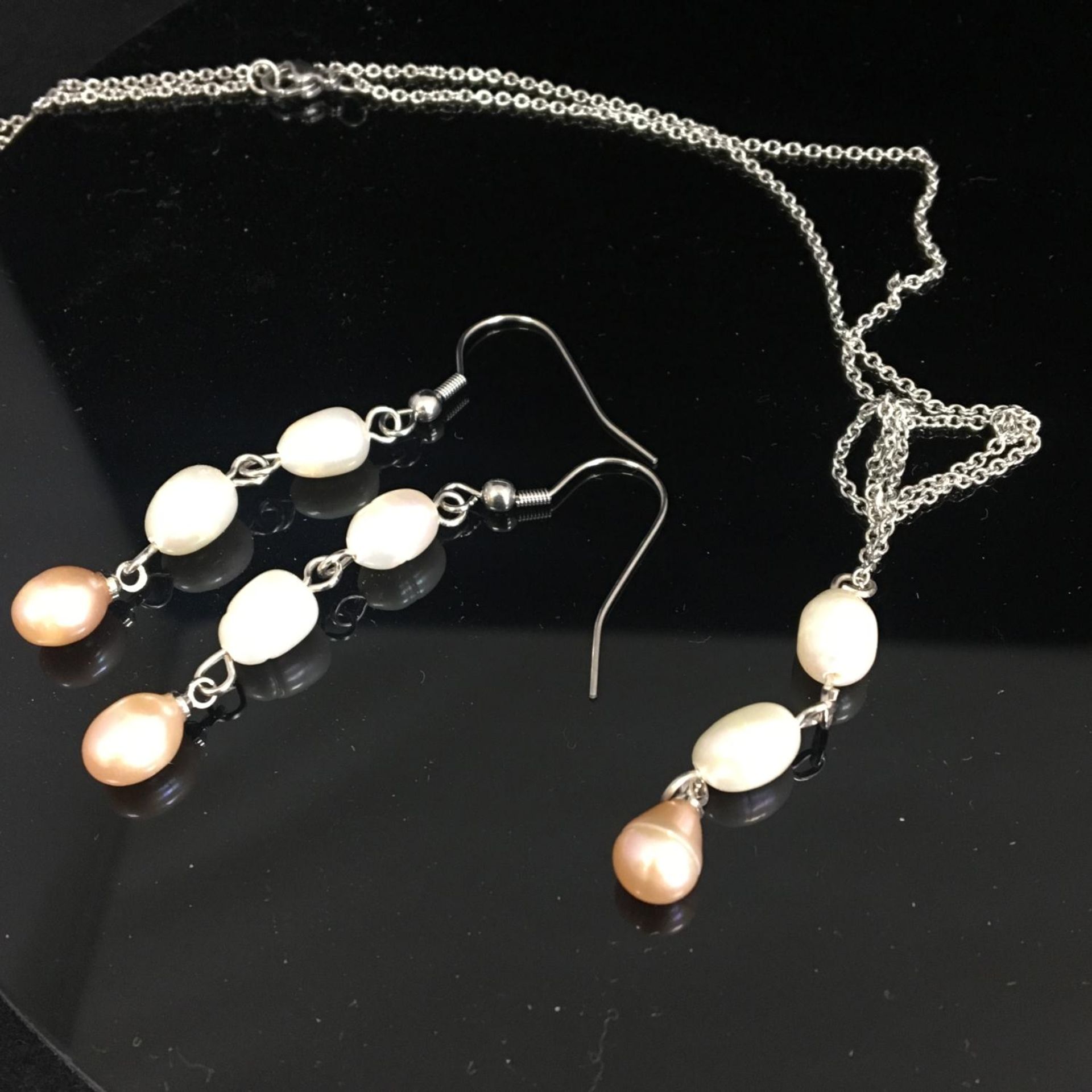 Freshwater pearl necklace with matching earrings. Includes free UK delivery.