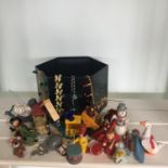 A storage box with its original contents which include a variety of vintage Christmas ornaments.