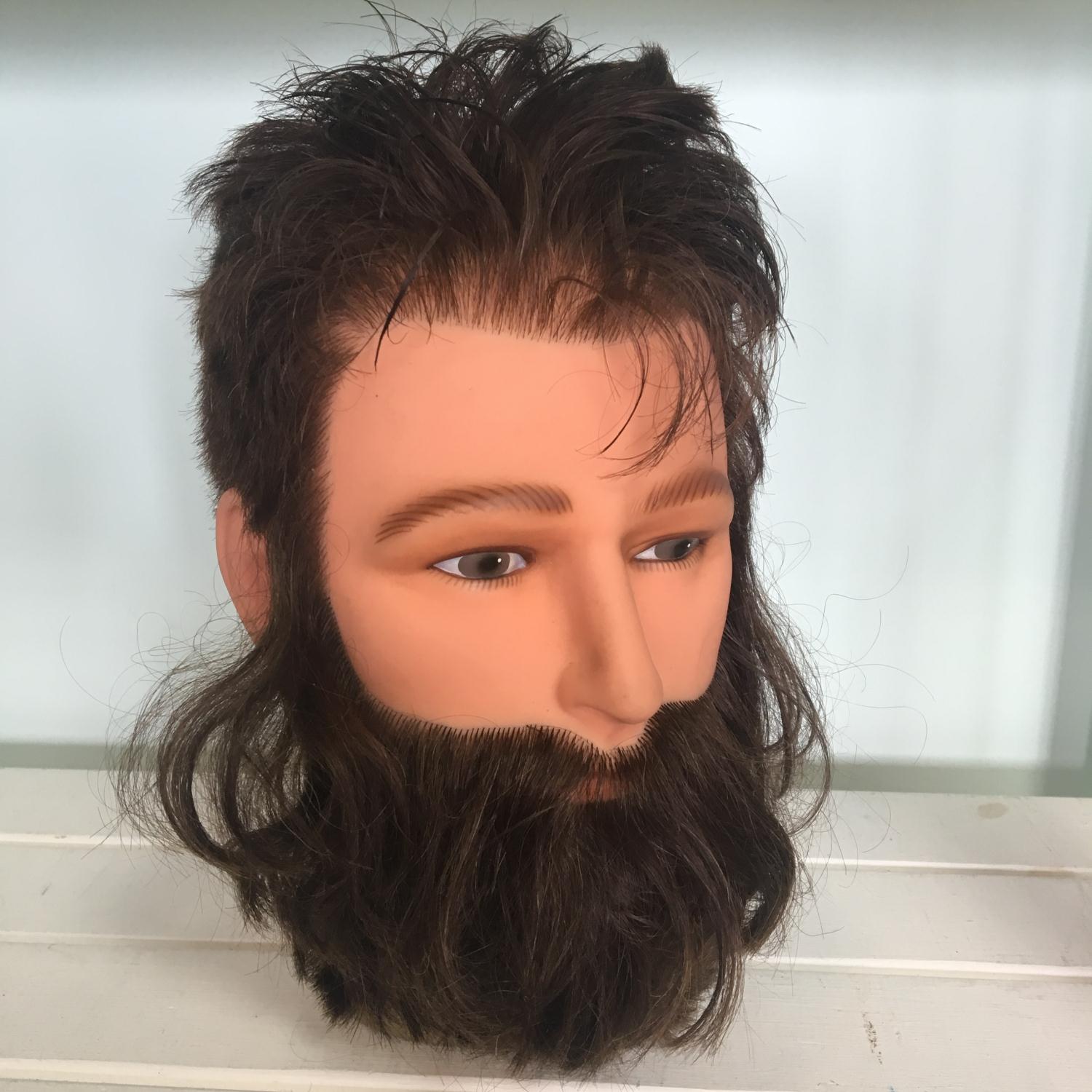 Vintage display model head with real hair. Includes free UK delivery.