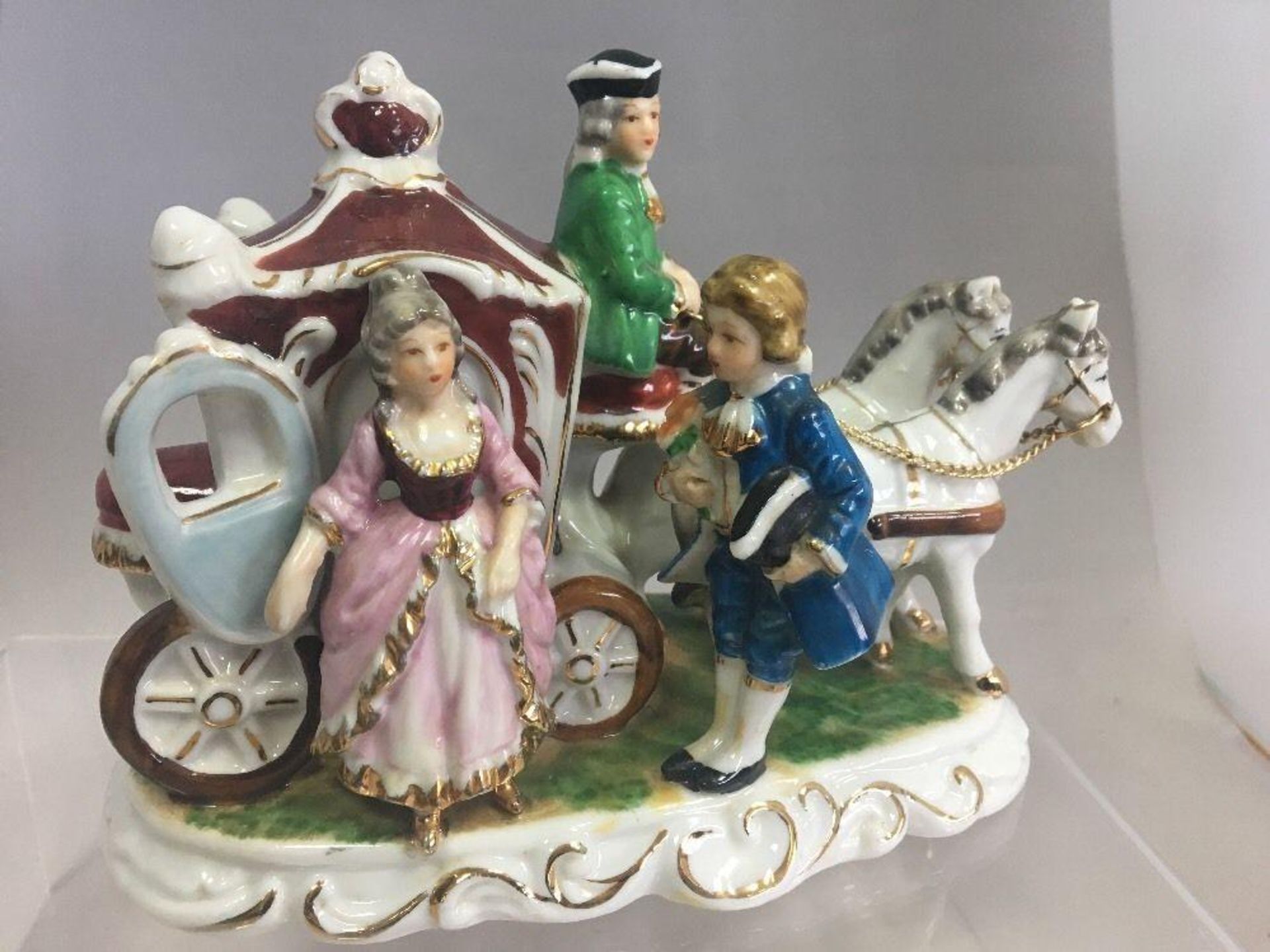 Vintage Porcelain Horse and Carriage with Music Box. Makers mark impressed to base. Condition - very