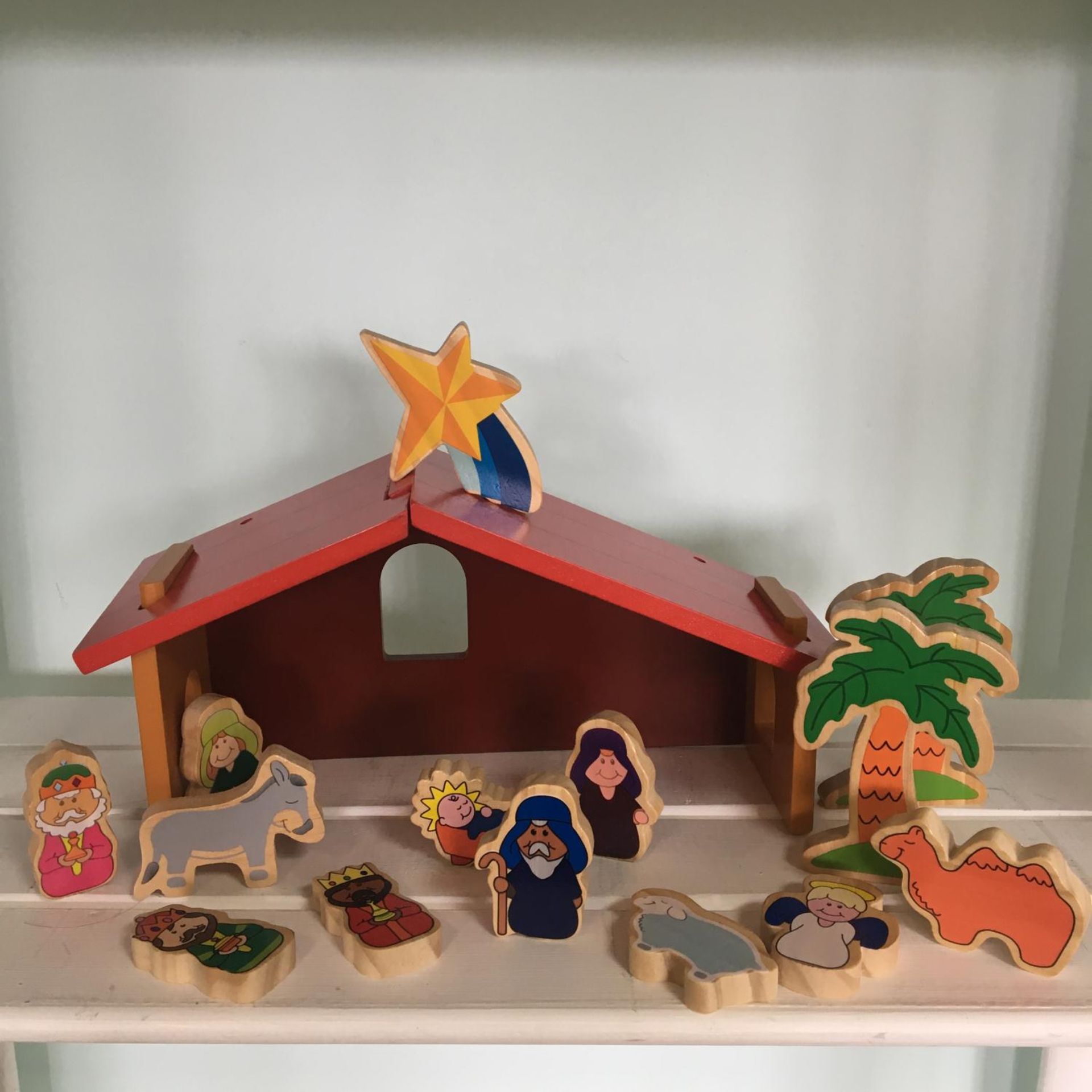 A child's toy nativity scene made up of multiple wooden pieces. Includes free UK delivery.