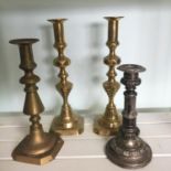 Group of antique candlesticks to include a Victorian brass diamond pair. Includes free UK delivery.