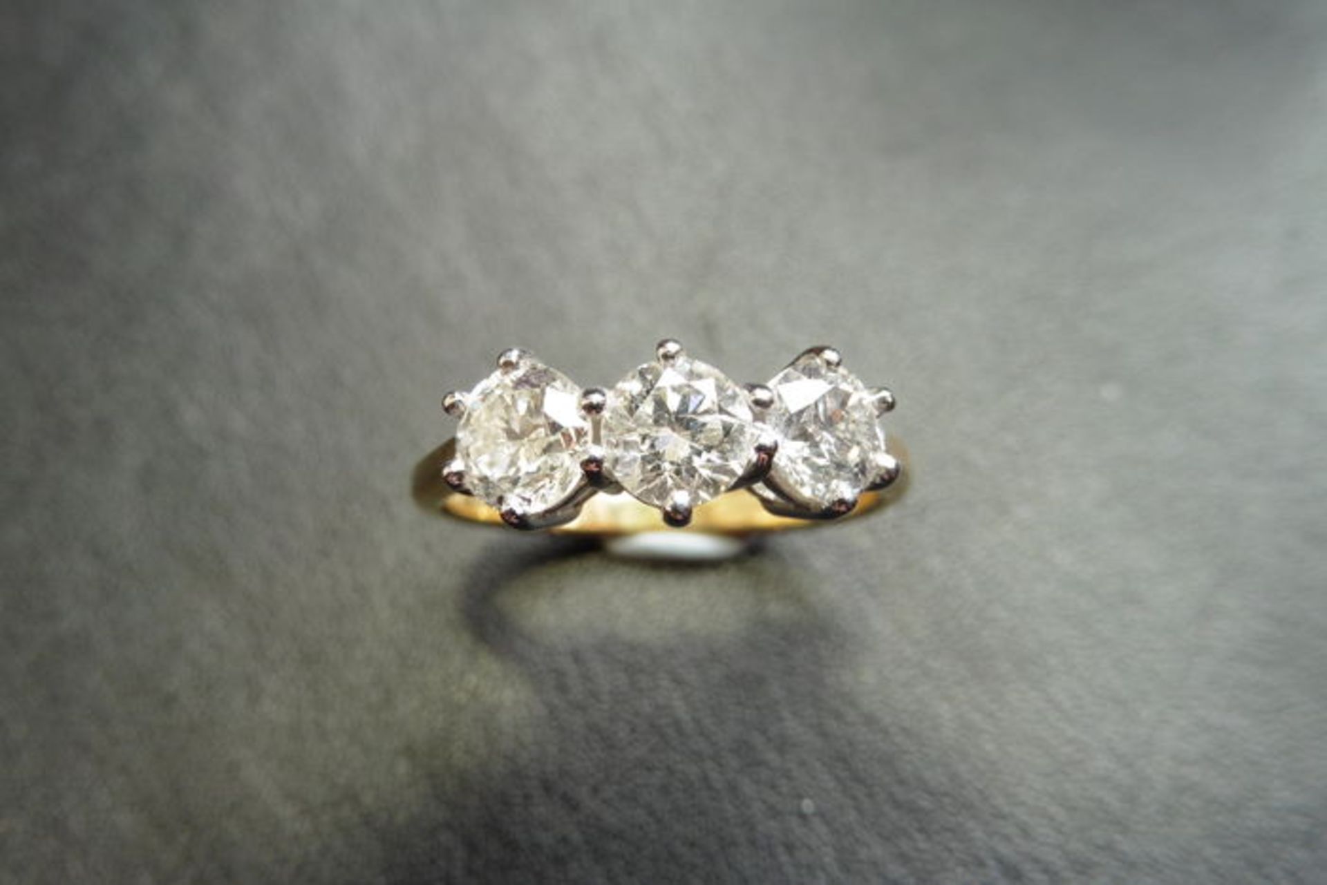 1.50ct trilogy diamond ring. 3 brilliant cut diamonds, I/J colour and Si3 clarity. 6 claw setting in