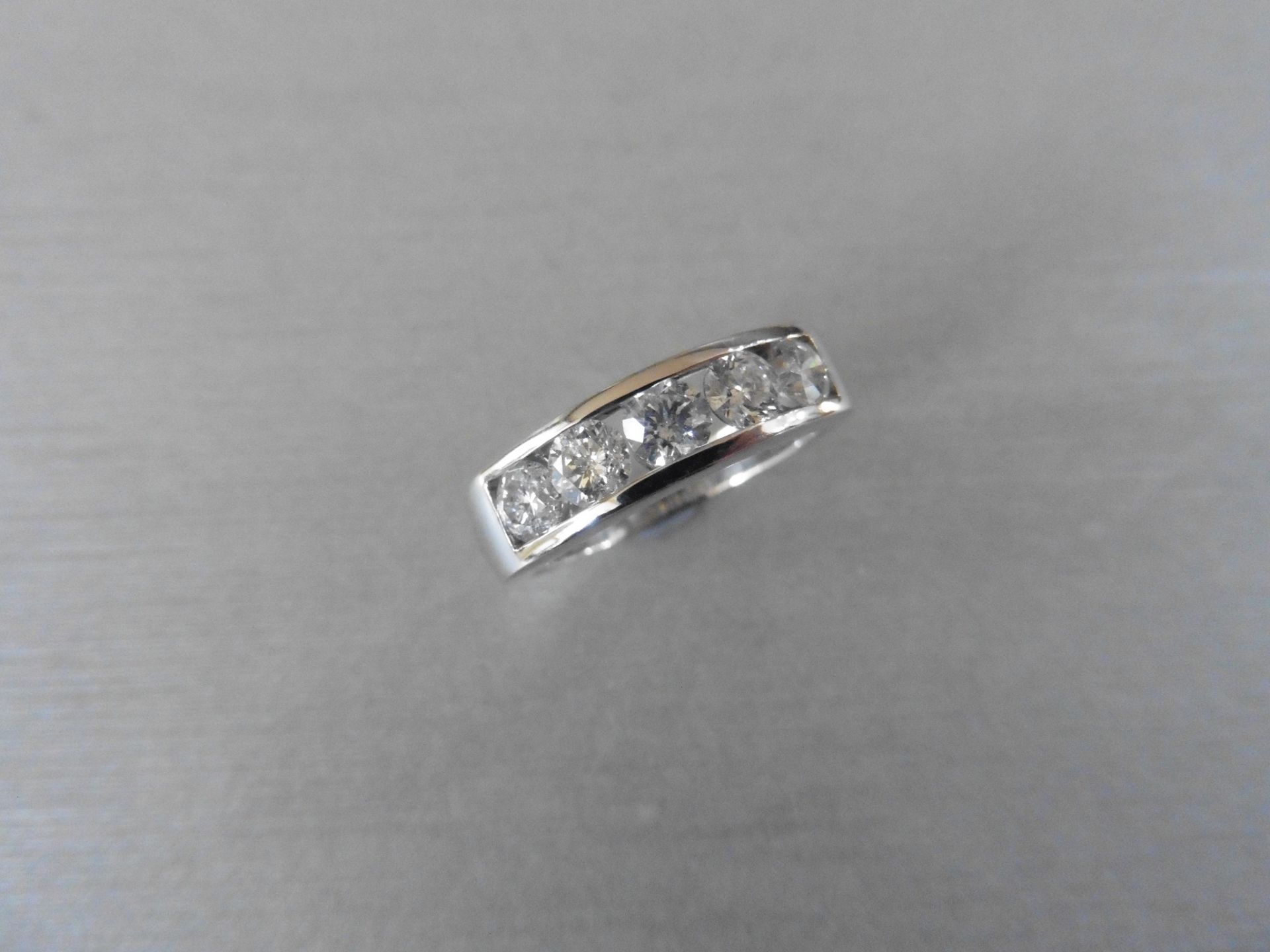 1.25ct diamond eternity style, band ring. Set with 5 brilliant cut diamonds, I colour and Si3