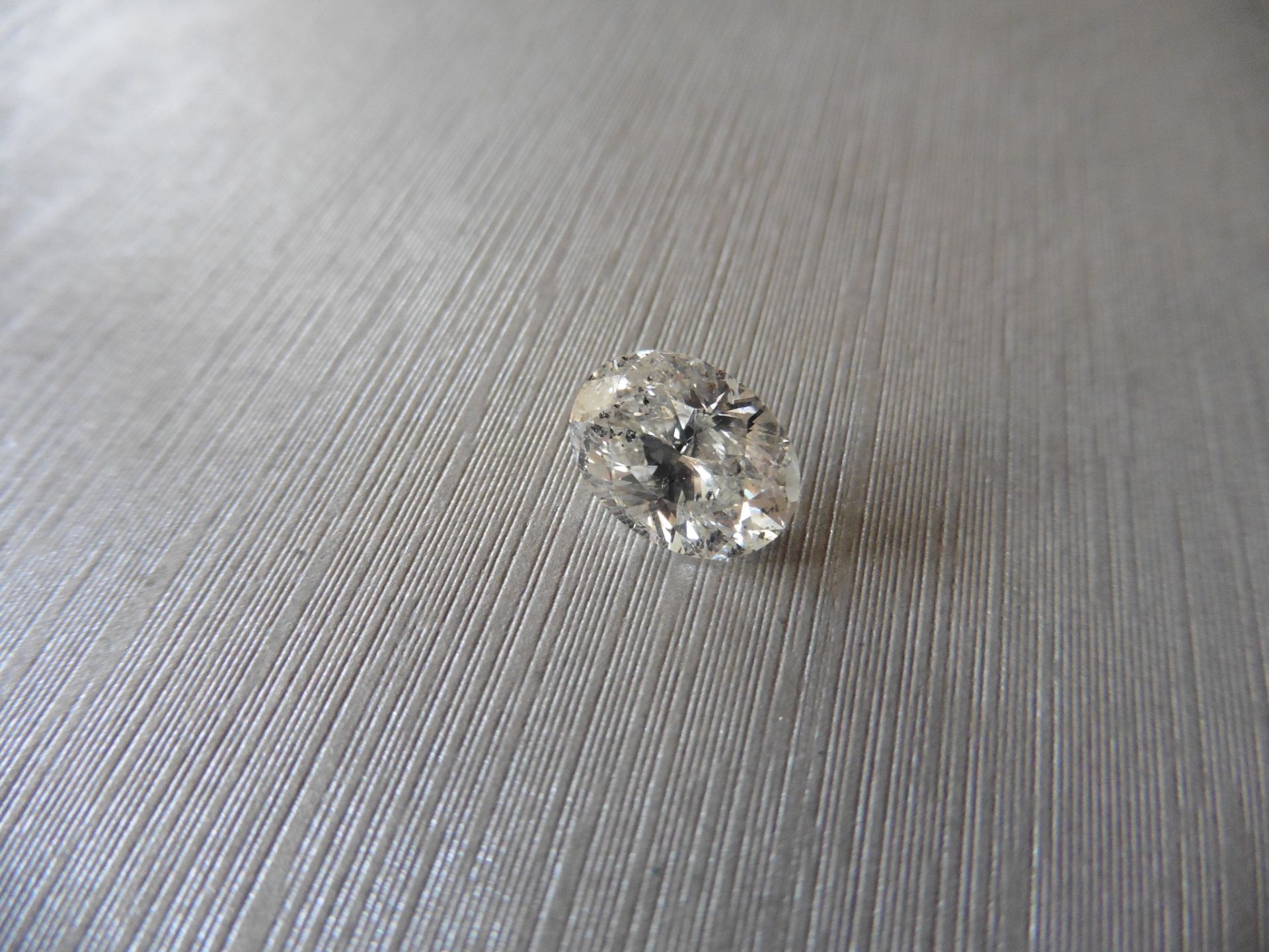 3.01ct single oval cut diamond. H colour and si3-I1 clarity. Ideal for ring mounting. Valued at £