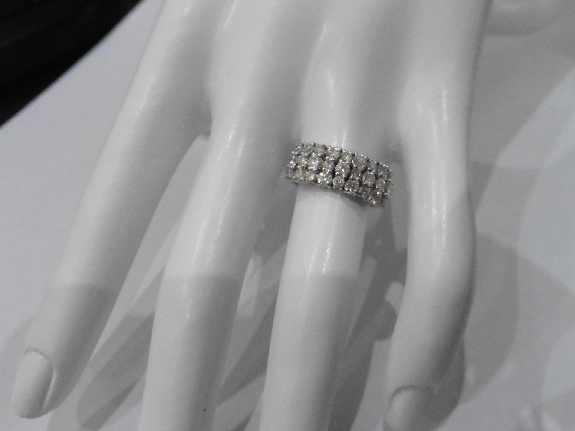 1.33ct Diamond band ring. Set with 3 rows of brilliant cut diamonds, I colour, si1-2 clarity. Claw - Image 6 of 6