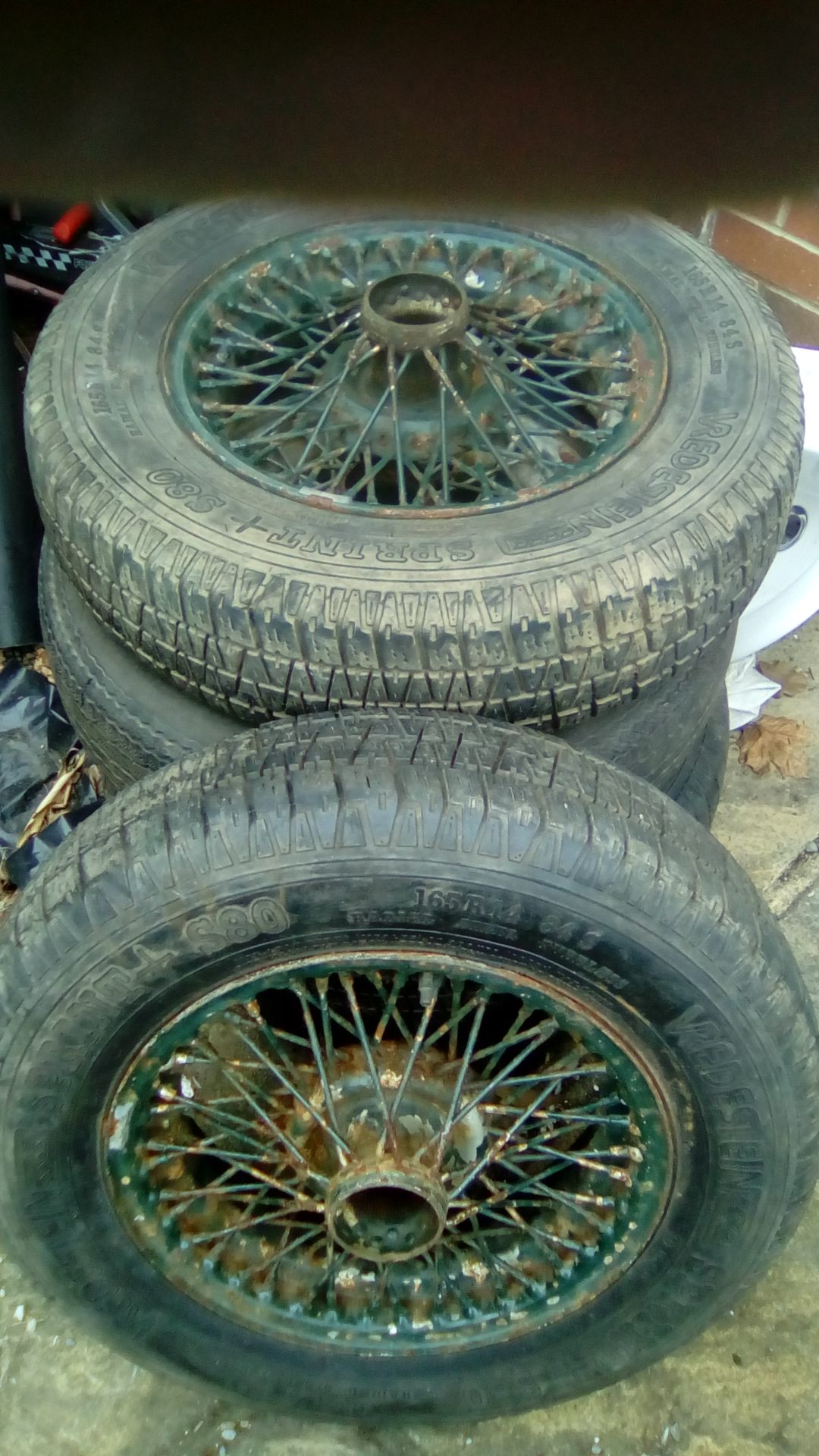 1 x set of 5 E Type Jaguar spoked wheels and tyres.   1 x set of 5 E Type Jaguar spoked wheels and