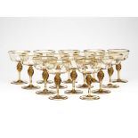 Fourteen Murano Mvm Cappellin Amber Champagne Glasses 1925   DIMENSIONS   Height 13,5cm, Diameter