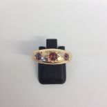 Pre-owned 3 stone Ruby in Gold marked 15ct