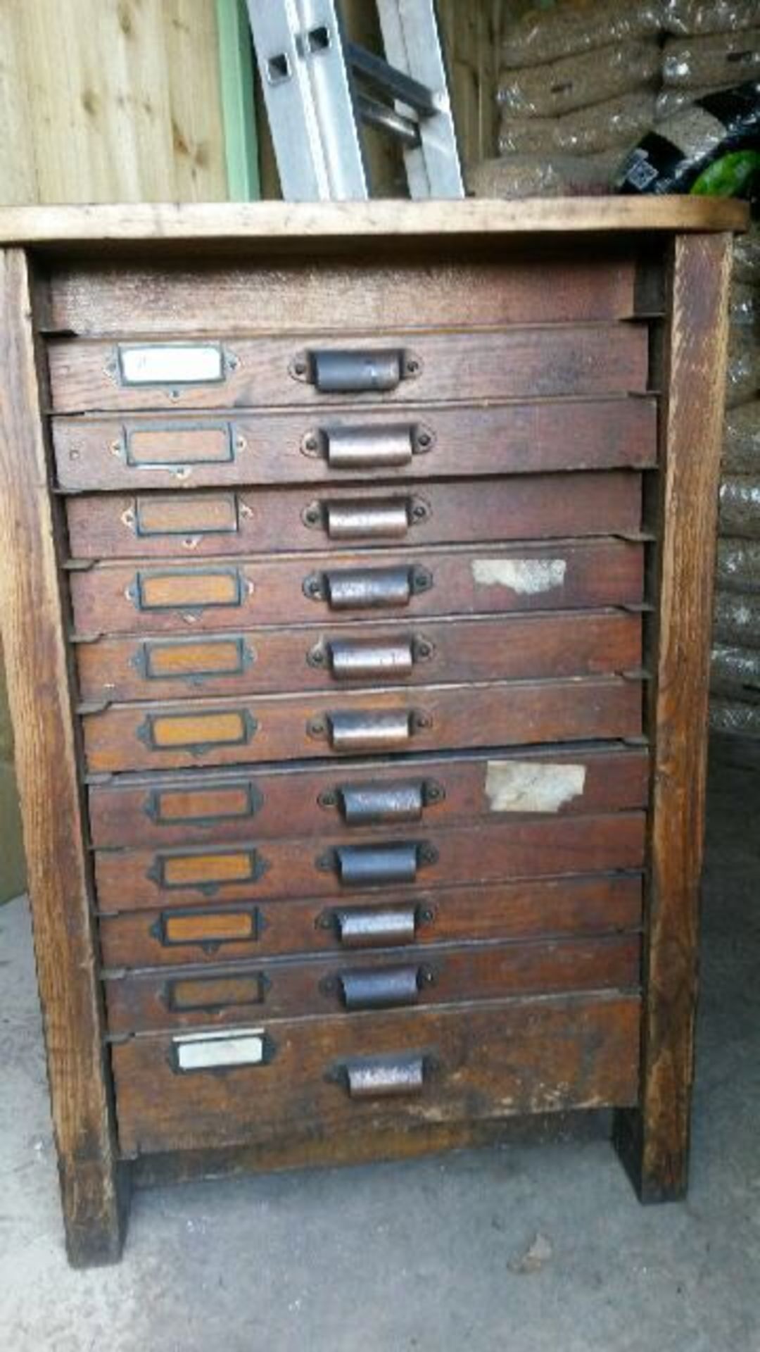 Chest of wooden filing draws, in good condition. Size Height 770mm. Width 535mm. Depth 520mm.