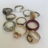 Group of ten vintage costume jewellery dress rings. Includes free UK delivery.