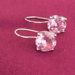 925 silver lever back earrings, each one set with a large pale pink stone. Includes free UK