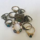 Group of ten vintage costume jewellery dress rings. Includes free UK delivery.