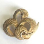 A vintage brooch signed TRIFARI. In good condition and includes free UK delivery