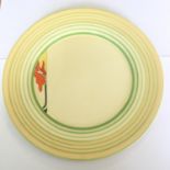 A Clarice Cliff Bizarre 7" plate in good condition with no chips or cracks. Includes free UK