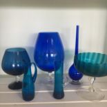 GROUP OF 6 VINTAGE BLUE GLASS WARE. Including brandy glass, pedestal bowl and vases. The hammer