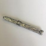 An antique hallmarked silver pencil holder for a chatelaine or watch fob, maker Francis Webb 1909.