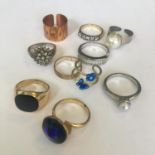 Group of ten vintage costume jewellery dress rings. Includes free UK delivery.