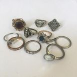 Group of ten vintage costume jewellery dress rings. Includes free UK delivery.