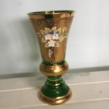 Antique green glass vase with gilt and raised enamel decoration. Standing at 7 inches high and in