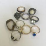 Group of ten vintage costume jewellery dress rings. Includes free UK delivery.