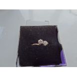 9CT Gold Ring Comprising Two Round Cut Diamond sin a White Gold Illusion Setting