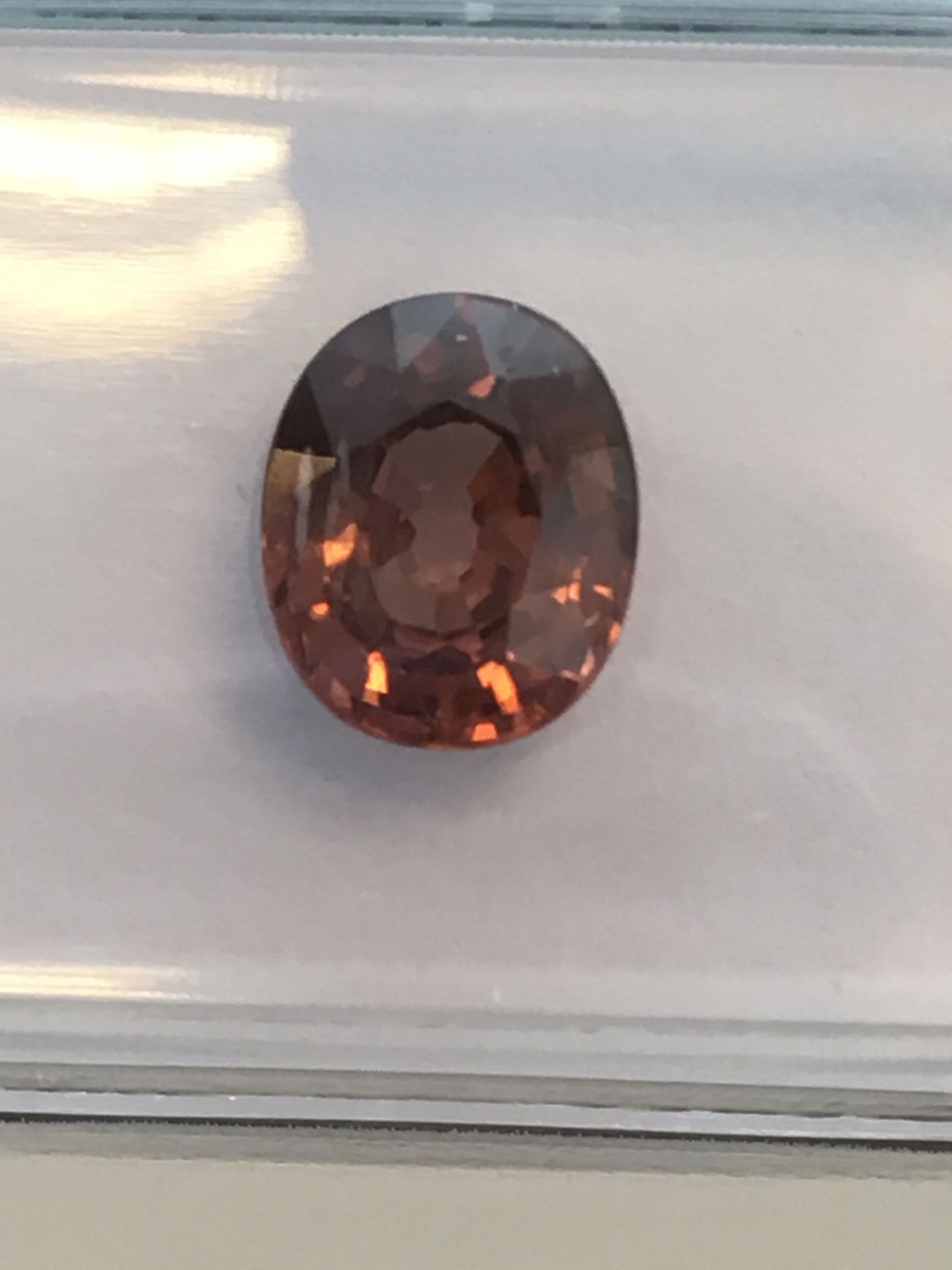 2.13ct Natural Zircon with IGI Certificate - Report No' 250600667. Oval Mixed Cut in Deep Brownish