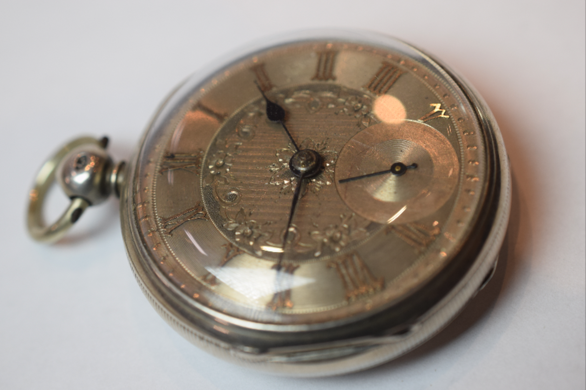 Open Face Silver Pocket Watch With Engraving Roman Numerals