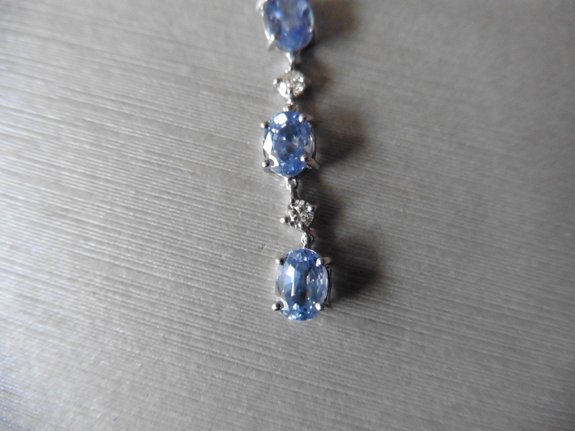 3ct ceylon sapphire and diamond drop earrings. Each set with 4 oval cut sapphires and 3 brilliant - Image 2 of 5