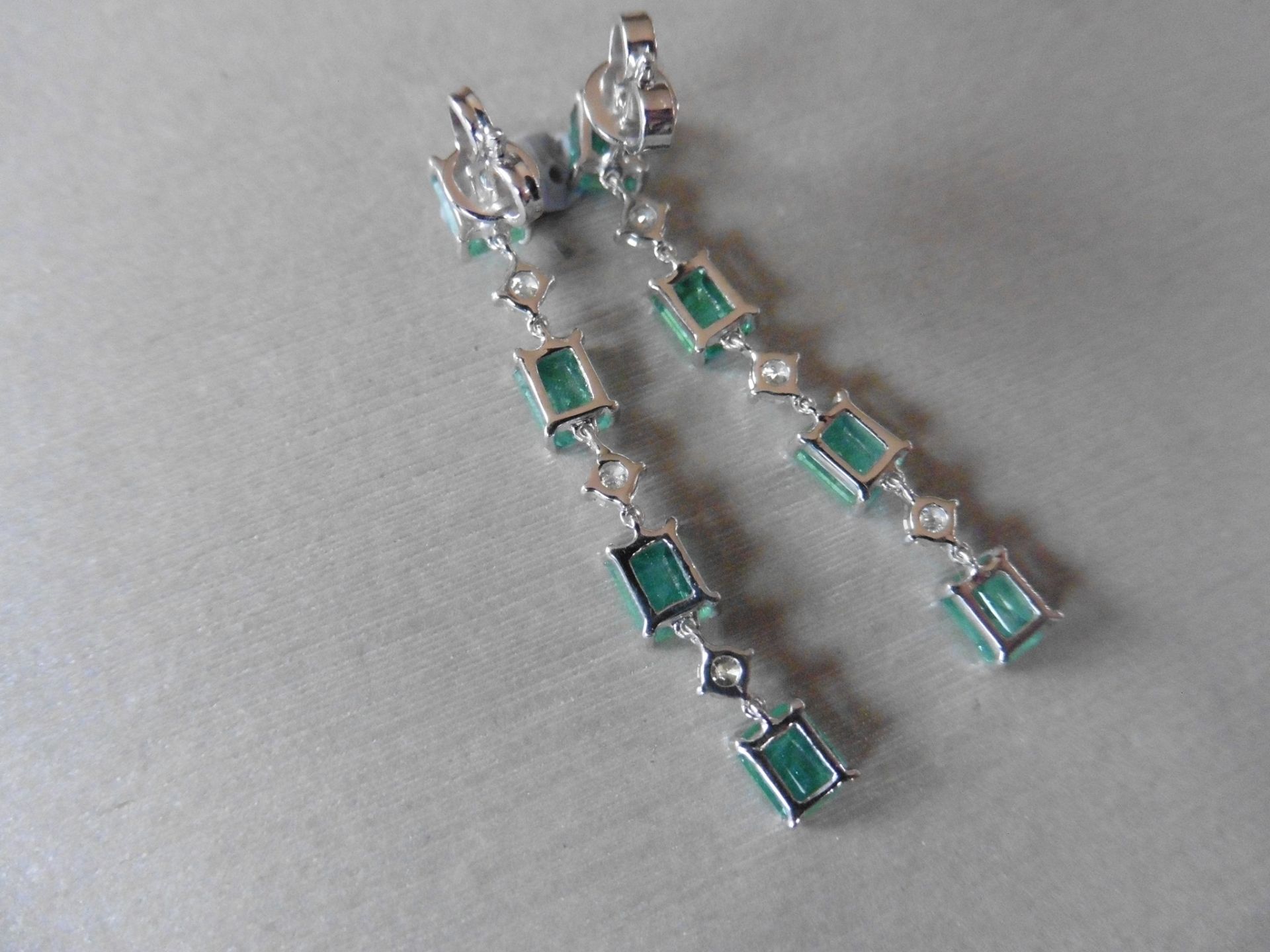 3ct emerald and diamond drop earrings. Each set with 4 emerald cut emeralds and 3 brilliant cut - Image 3 of 5