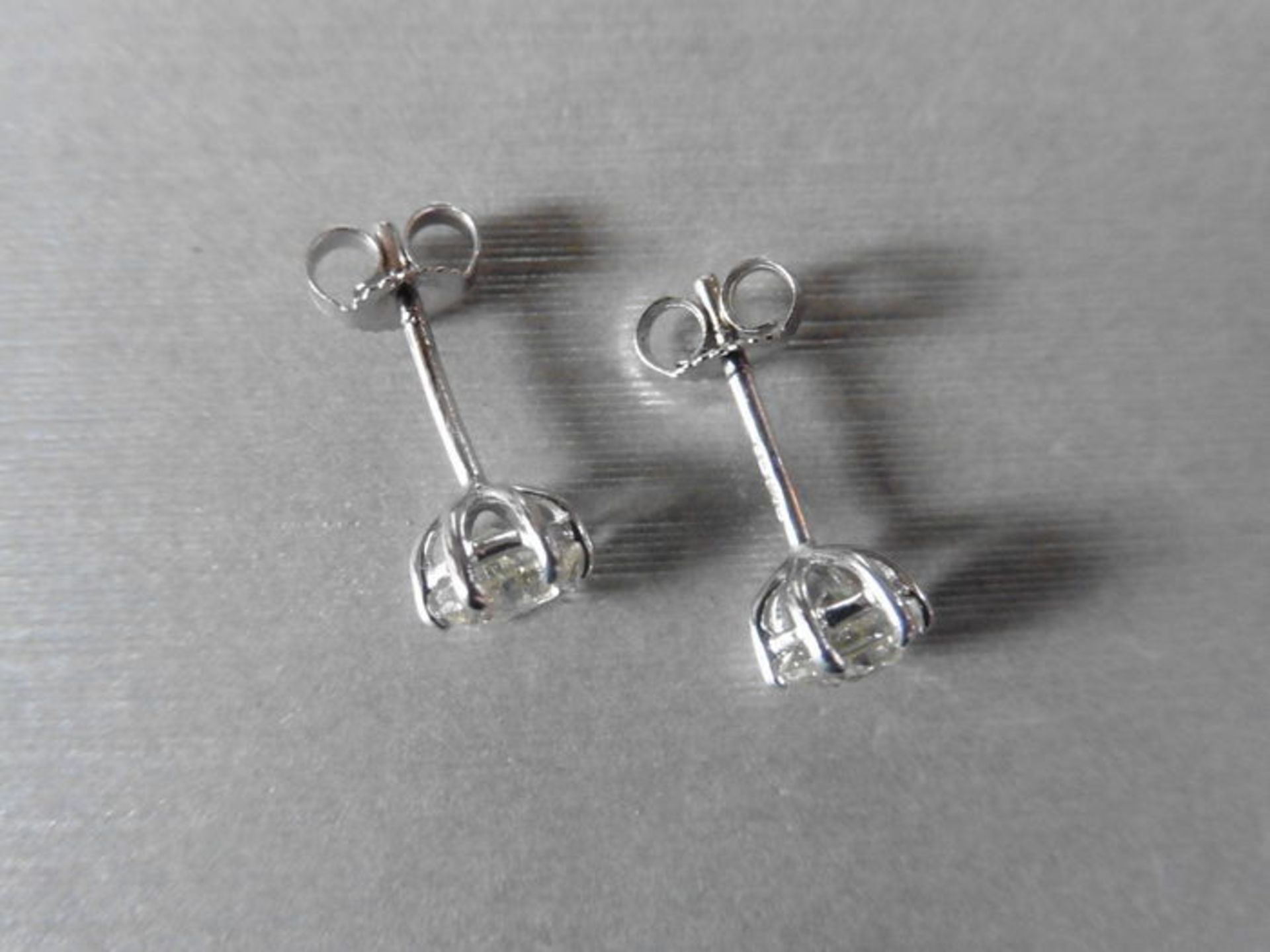 1.90ct Diamond set solitaire style earrings. Each set with a brilliant cut diamond, J colour, i1 - Image 3 of 3