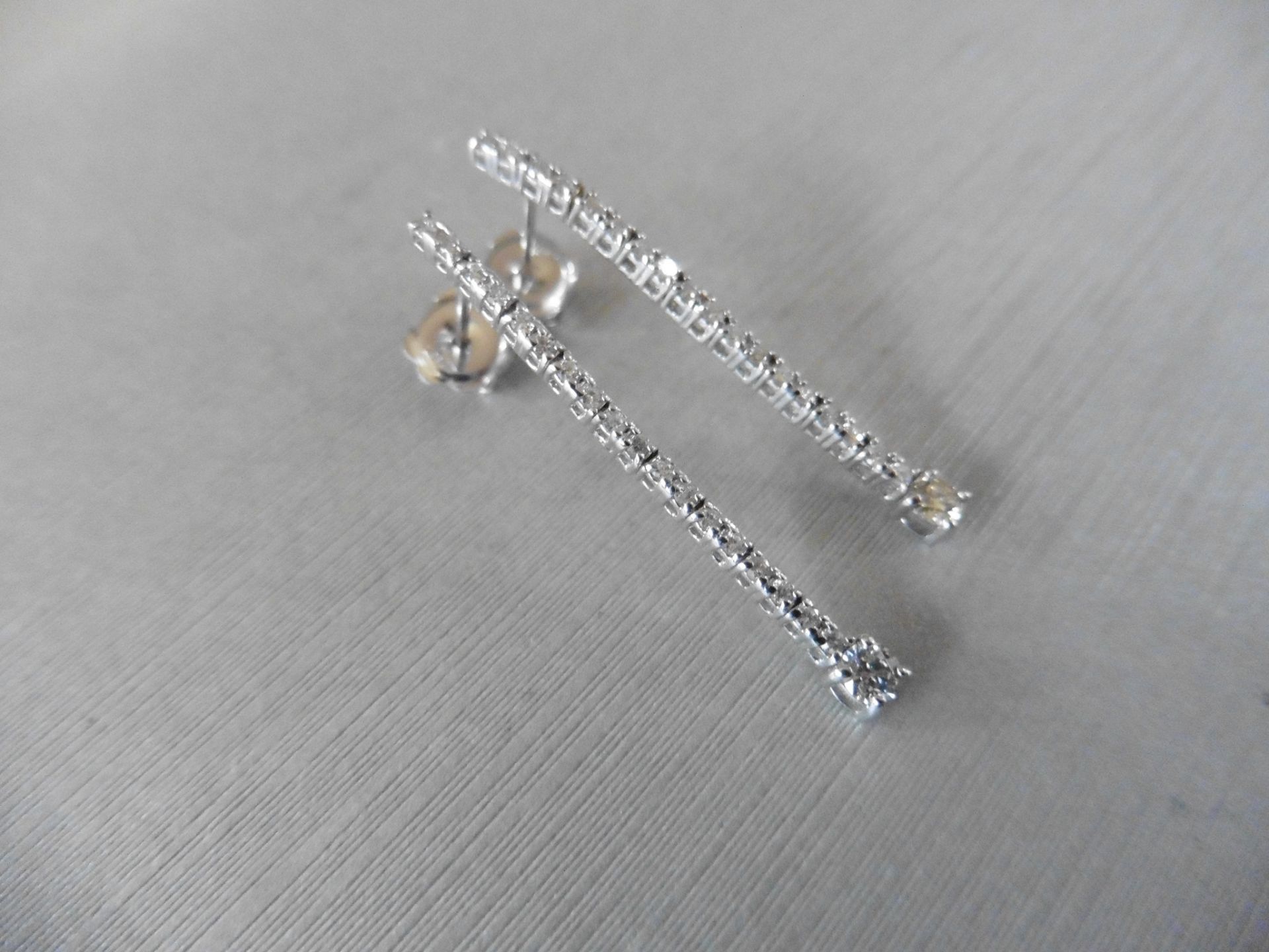 0.60ct 18ct white gold diamond drop earrings set with brilliant cut diamonds. I colour, si2 clarity. - Image 2 of 3